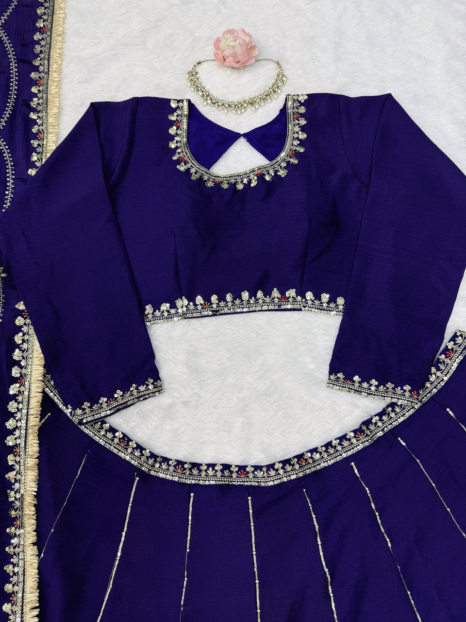 Radiant Rani Pink Silk Lehenga Choli Adorned with Opulent Heritage Floral Motifs and Intricate Zari Borders